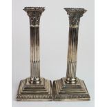 Silver pair of Corinthian column candlesticks, hallmarked 'G&S.Co.Ld, London 1903' (Goldsmiths &