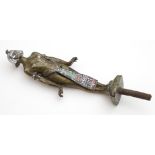 Car Mascot. An original brass car mascot, depicting a female Egyptian figure with enamel decoration,