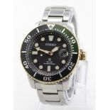 Gents Seiko Solar X divers watch. The black dial with green/black bezel on a stainless steel