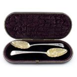 Very attractive boxed pair of silver Old English bright cut berry spoons, lovely gilt bowls, both