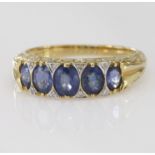 Yellow metal marked 18ct Sapphire and Diamond Ring size N weight 4.7g