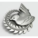 Georg Jensen brooch (no. 309), depicting a bird surrounded by a leaf, makers marks stamped to