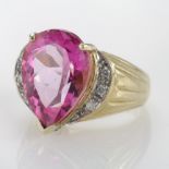 9ct hallmarked Gold Ring set with pear shaped Pink Tourmaline surrounded by Diamonds size M weight