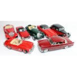 Seven 1/18th scale model cars by Ertl, Maisto, Burago, Polistil, etc., models include Jaguar,