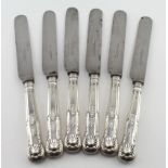 Six King's pattern, silver handled dessert knives; the handles are hallmarked "GH Sheffield, 1907;