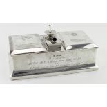 Silver presentation smokers desk companion, wood lined, missing 4 small feet to base. Engraved - "