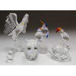 Swarovski. Four Swarovski crystal figures of birds, including, Toucan, Owl, Eagle, Swan, etc.,