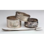Three Silver Napkin rings plus a pickle fork weight 1.7oz