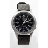 Gents Seiko 5 military style automatic wristwatch, the black dial with white arabic numerals with