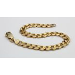 Yellow metal (tests as 14ct and stamped 14kt) curb bracelet, length approx 8" weight 18.4g