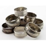 Eight silver napkin rings, various hallmarks. Weighs 4oz approx.