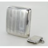 Silver curved gilt lined cigarette case with engraved initials to lid, hallmarked 'C.E.T, Birmingham