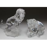 Swarovski. Two Swarovski crystal figures, comprising Lion on a Rock & Grizzly bear, height 11.5cm