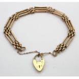 9ct gold three bar gate bracelet with safety chain, hallmarked Chester but date letter worn,