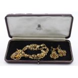Matching suite of 18ct Gold floral Necklace and screw back Earrings set with Citrines weight 37.3g