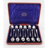Boxed set of twelve silver coffee spoons hallmarked JS, Sheffield, 1909. Weight of silver 6oz.