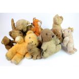 Teddy Bears. A box of approximately twelve old teddy bears (sold as seen)