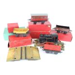 Stronlite O guage black locomotive, together with a collection of hornby wagons, break van (some