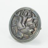Georg Jensen silver brooch (no. 285), depicting a figure riding a fish, makers marks stamped to