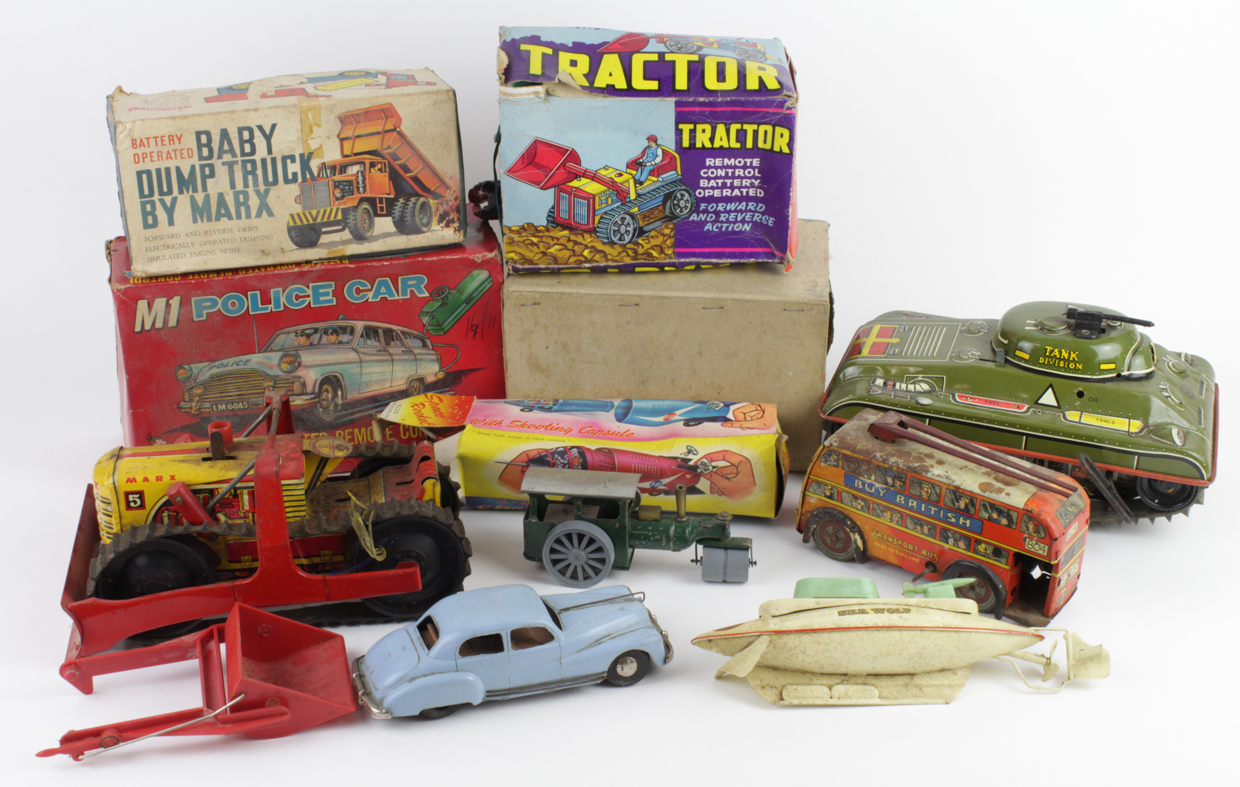 Vintage Toys. A collection of vintage toys (some boxed), including Marx Battery Operated Dump Truck,