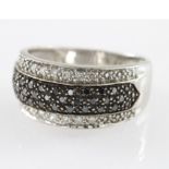 9ct hallmarked White Gold Ring pave set with white and black Diamonds size N weight 3.2g