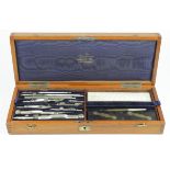 Mahogany cased drawing set by J. Coombes, includes ivory protractor & boxwood rulers, height 6cm,