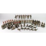 Britains. A collection of approximately ninety Britains lead soldiers, circa early to mid 20th