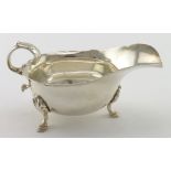 Silver sauce boat hallmarked AJH, London 1897. Weighs 4.75oz.