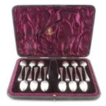 Scottish boxed set of 12 silver right facing Galleon backed Hanoverian Pattern teaspoons & sugar