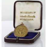 Hallmarked (Birmingham 1928) 9ct gold football medal "London Football Combination", un-named and