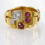 Yellow Gold Ring marked 18ct set with Rubies and Diamond size P weight 10.6g