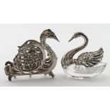 Two swan related items, one is marked for 800 silver and the other is a silver mounted salt which