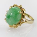 Yellow metal Ring marked 18ct .750 with large Jade stone and two Diamonds size N weight 6.2g