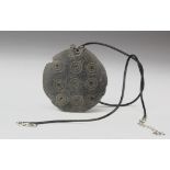 Gandhara Schist Pendant, C. 300 A.D. Gandharan Schist Pendant with Sun motif. 9 large sun symbols