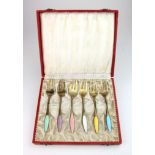 Boxed set of six Danish sterling silver-gilt and coloured enameled forks, by Frigast (approx 22.9g