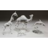 Swarovski. Four Swarovski crystal figures, including, Camel, Dolphin, Giraffe, etc., height 14cm