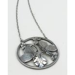 Georg Jensen silver pendant necklace designed by Arno Malinowski (no. 105), depicting two