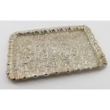 Silver dressing table tray, very ornate, hallmarked HM Birmingham, 1894. Weighs 11oz approx.