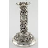 Highly ornate silver candlestick (may have a loaded base) - hallmarked WC (William Comyns & Sons,