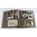 Autograph Album. A large autograph album containing approximately ninety-five black & white