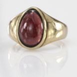 Yellow metal ring tests as 9ct set with pear shaped Garnet size N weight 8.6g