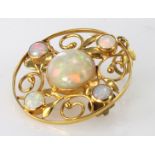 Yellow metal marked 15ct round Opal set brooch /pendant weight 4.7g