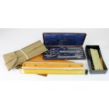 Cased drawing set by Harper & Tunstall, together with a cased WWII Military slide rule for .303