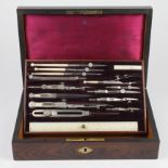 Rosewood cased drawing set with brass inlay, circa late 19th Century, height 6.5cm, width 26cm,