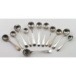 Twelve silver salt spoons , all Old English pattern, all have British hallmarks. Weight 1.75oz