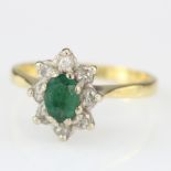 18ct Yellow Gold Emerald and Diamond oval cluster Ring, total diamond weight approx. 0.25ct.