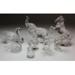 Crystal Glass. A group of eight pieces of Crystal Glass, including Swarovski, Waterford etc.,