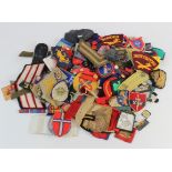 Assorted Cloth badges in a box mostly WW2 British Formation signs, shoulder titles, arm badges and