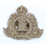 Suffolk Regiment officers cap badge in grey plastic with fold over lugs, maker marked 'F&G'. KC