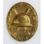 German Wounds badge in gold, L/14 maker marked.